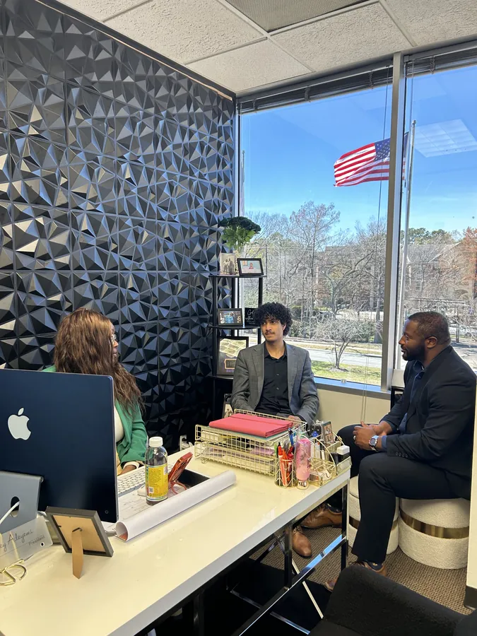 Ireti Provisions team working at the office