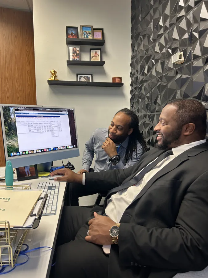 Ireti Provisions team reviewing business strategy