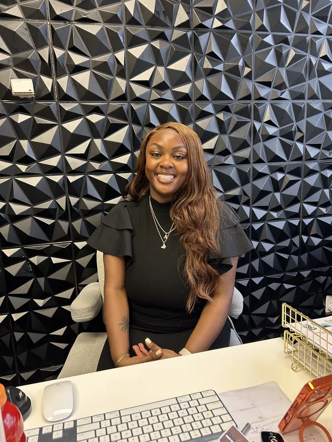 Ireti Provisions team member at their desk